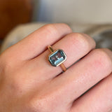 Teal sapphire single-stone ring