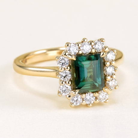 Square-cut teal sapphire & diamond cluster ring