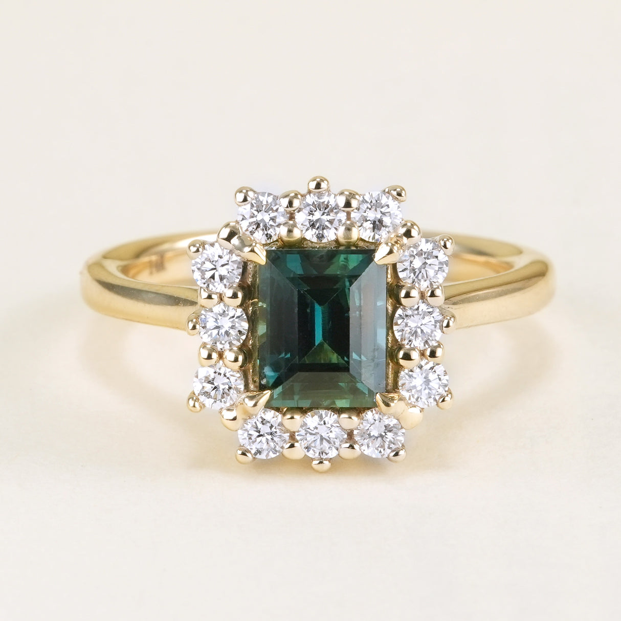 Square-cut teal sapphire & diamond cluster ring
