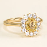 Yellow sapphire and diamond cluster engagement ring