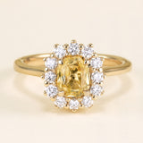 Yellow sapphire and diamond cluster engagement ring