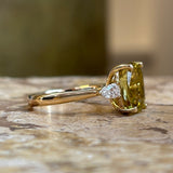 Chrysoberyl and pear-cut diamond three-stone ring