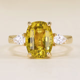 Chrysoberyl and pear-cut diamond three-stone ring