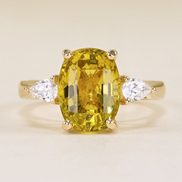 Chrysoberyl and pear-cut diamond three-stone ring