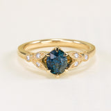 Deep blue sapphire and diamond engagement ring
