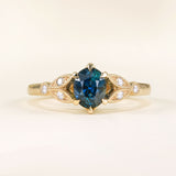 Deep blue sapphire and diamond engagement ring