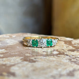 Antique, Edwardian diamond and emerald five-stone ring