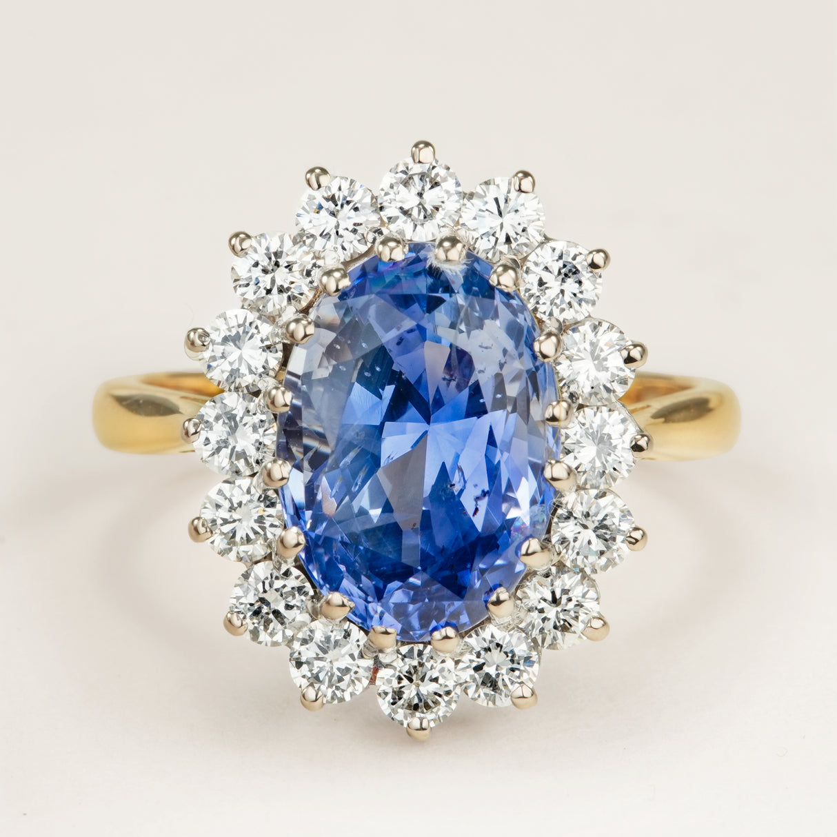 Vintage, Sri Lankan 5ct sapphire and diamond cluster engagement ring