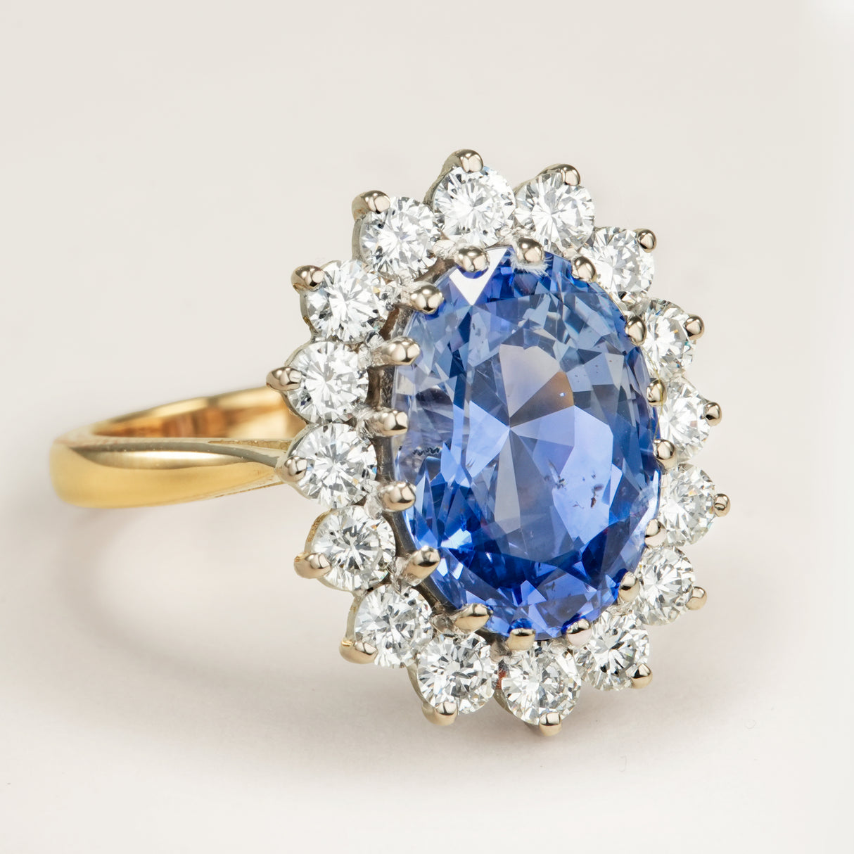 Vintage, Sri Lankan 5ct sapphire and diamond cluster engagement ring
