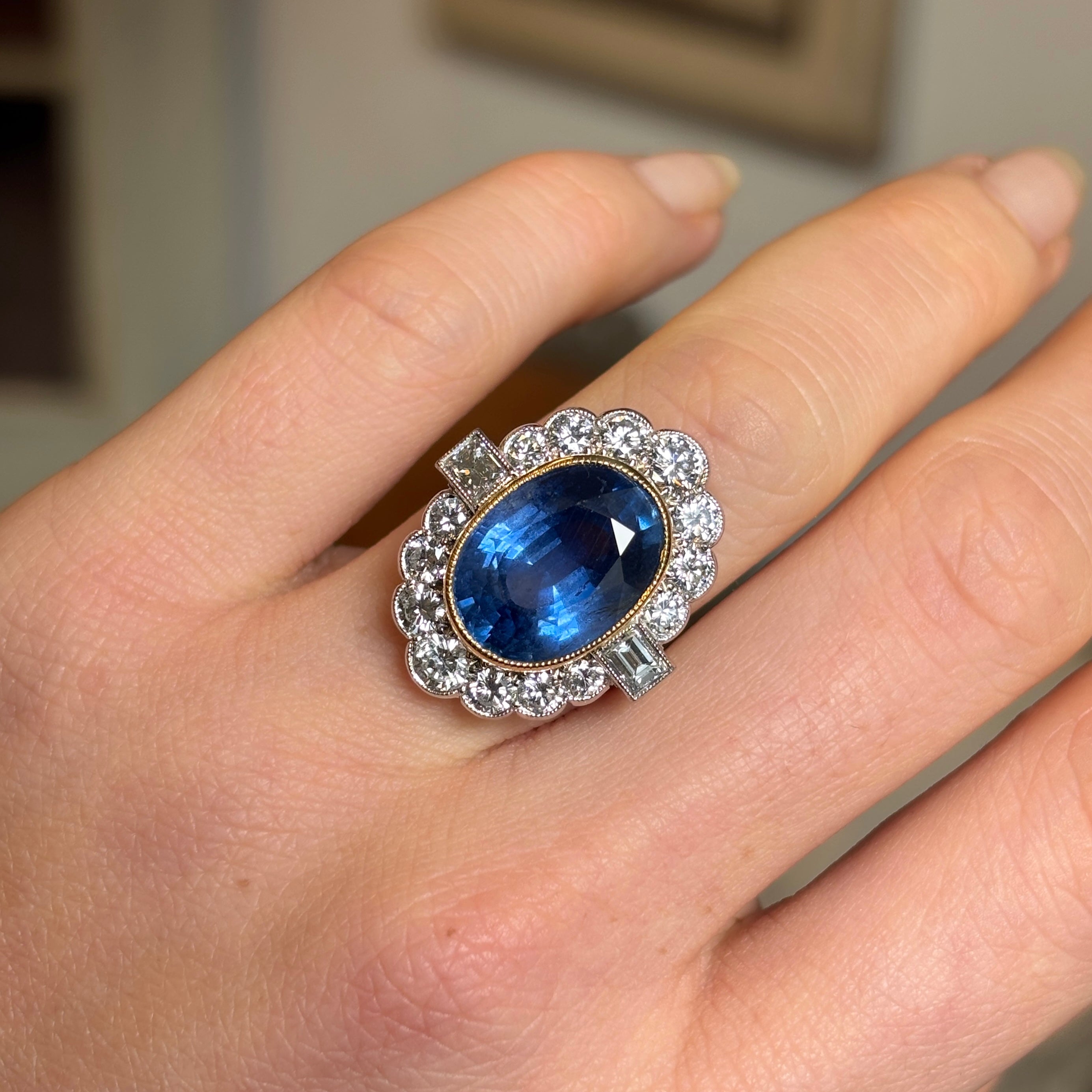 Vintage, 9.50ct oval-cut sapphire and diamond cluster ring