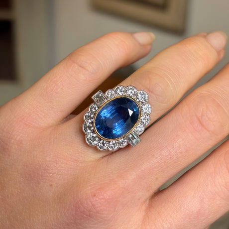 Vintage, 9.50ct oval-cut sapphire and diamond cluster ring