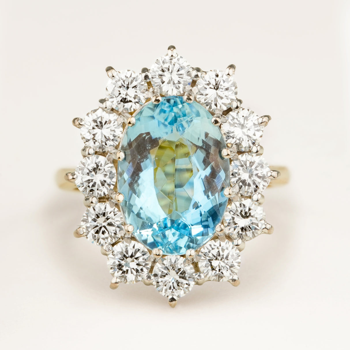 Vintage, 1980s aquamarine and diamond cluster engagement ring