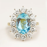 Vintage, 1980s aquamarine and diamond cluster engagement ring