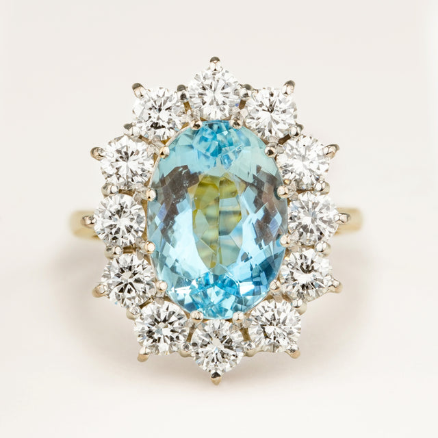 Vintage, 1980s aquamarine and diamond cluster engagement ring