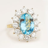 Vintage, 1980s aquamarine and diamond cluster engagement ring