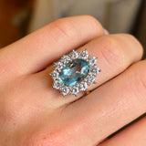 Vintage, 1980s aquamarine and diamond cluster engagement ring