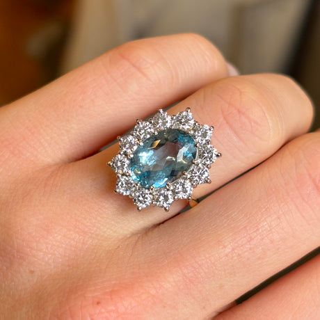 Vintage, 1980s aquamarine and diamond cluster engagement ring