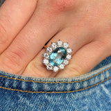 Vintage, 1980s aquamarine and diamond cluster engagement ring