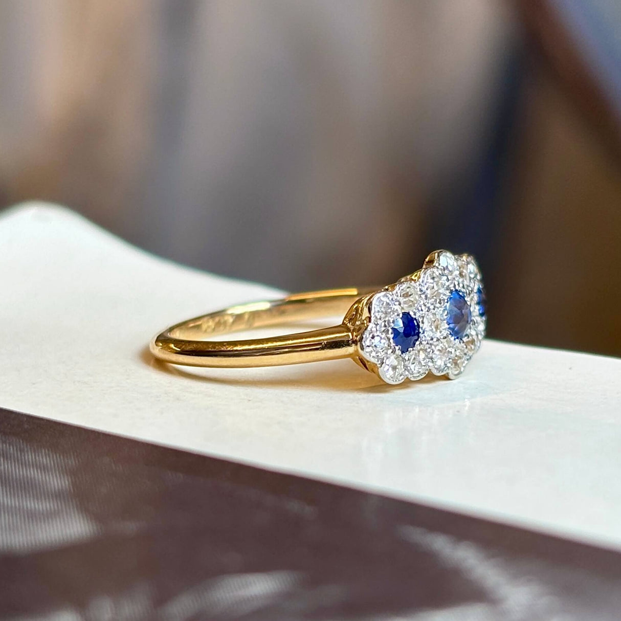 Antique, Edwardian sapphire and diamond triple cluster ring