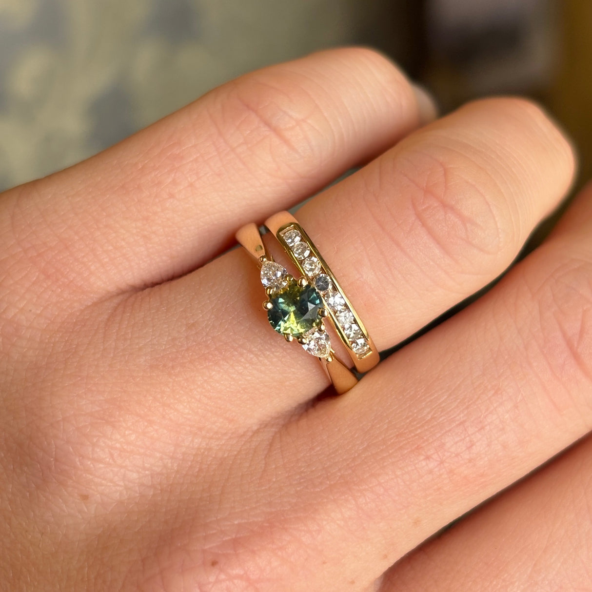 Teal sapphire and diamond three-stone engagement ring