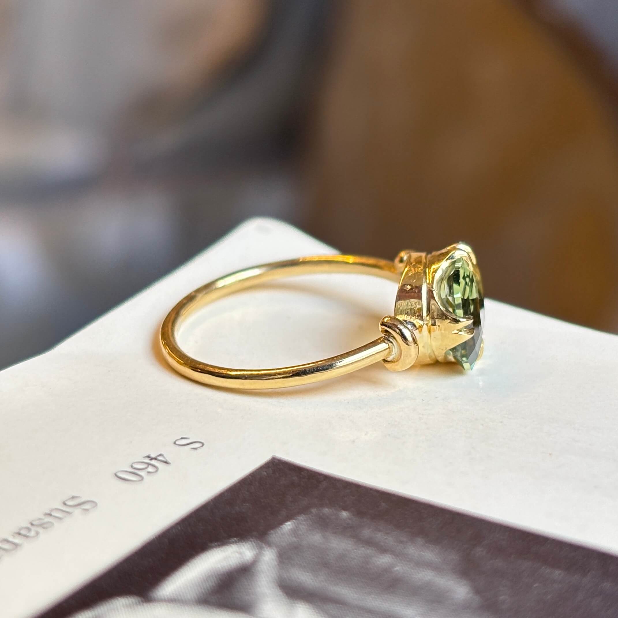 Vintage, 1980's green sapphire solitaire engagement ring