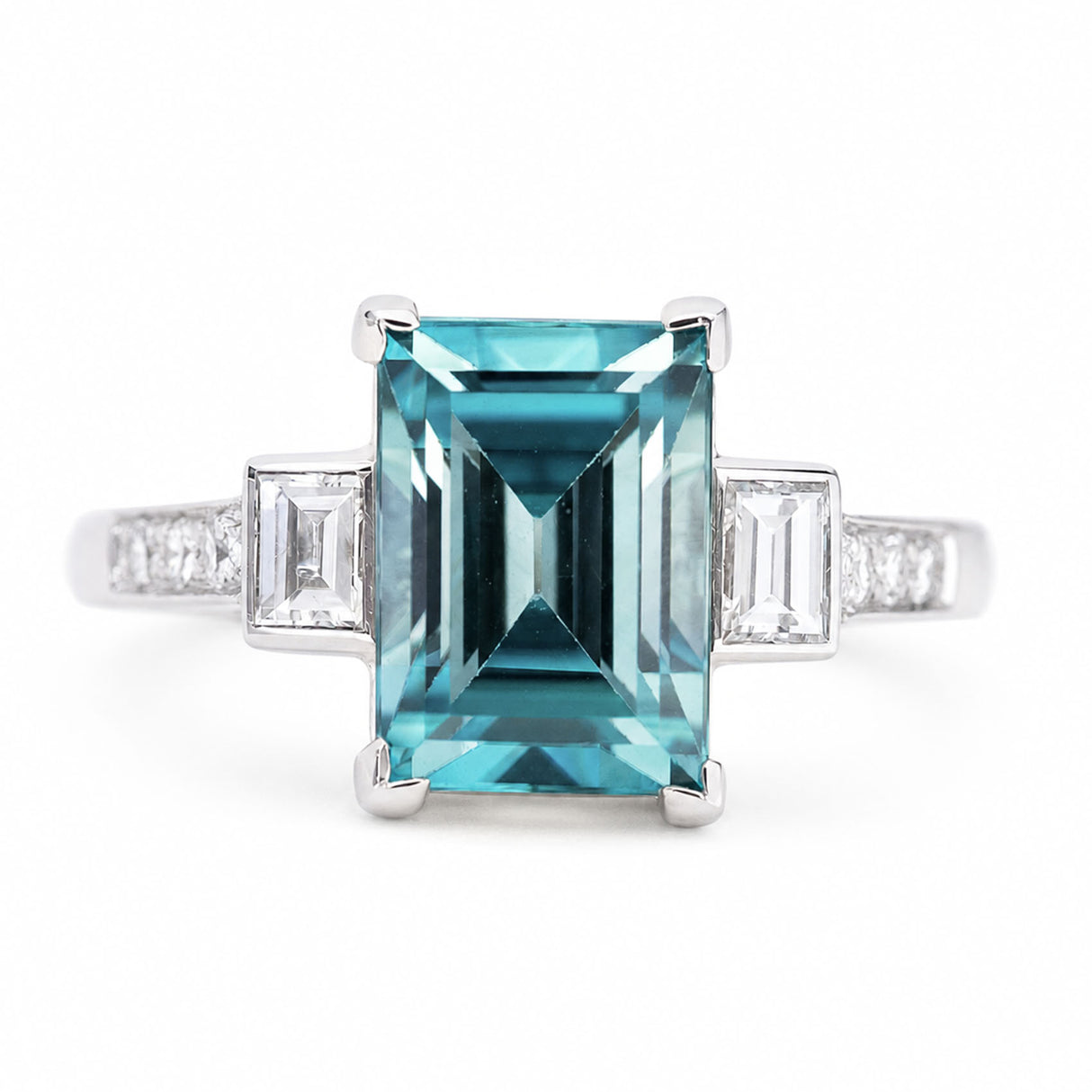 A close-up of an antique, Art Deco 1920s blue zircon & diamond ring in platinum.