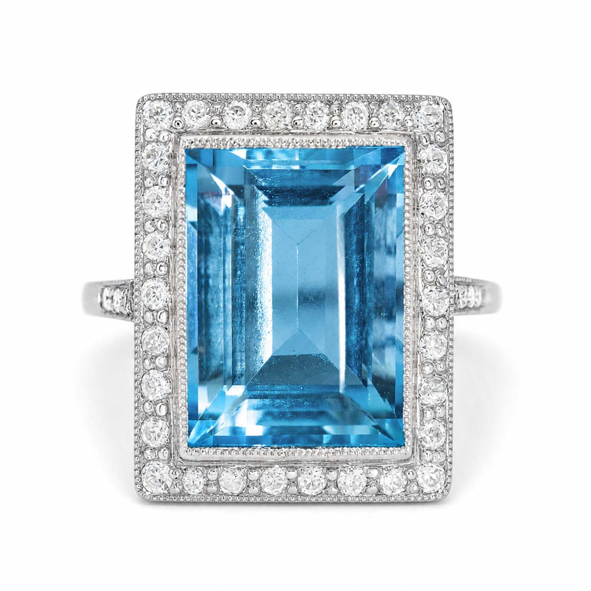 An antique Art Deco aquamarine and diamond cocktail ring in platinum.