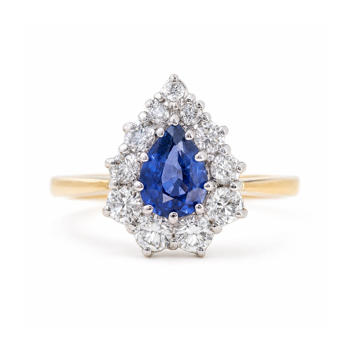 Vintage 1980s sapphire and diamond cluster engagement ring in yellow gold