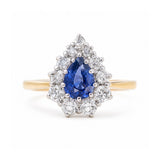 Vintage 1980s sapphire and diamond cluster engagement ring in yellow gold