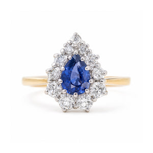 Vintage 1980s sapphire and diamond cluster engagement ring in yellow gold