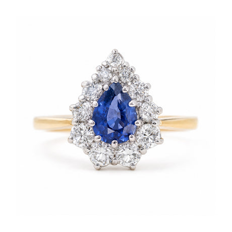 Vintage 1980s sapphire and diamond cluster engagement ring in yellow gold