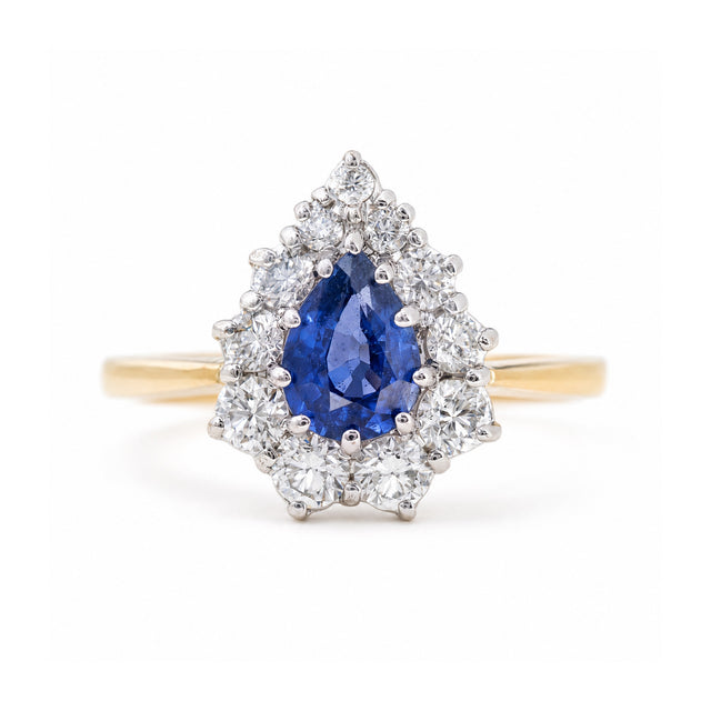 Vintage 1980s sapphire and diamond cluster engagement ring in yellow gold
