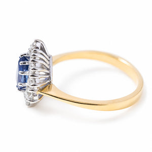 a rear view showing the open gallery of a 1980s sapphire cluster ring