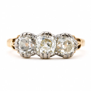Antique Victorian three-stone diamond engagement ring with old-cut diamonds