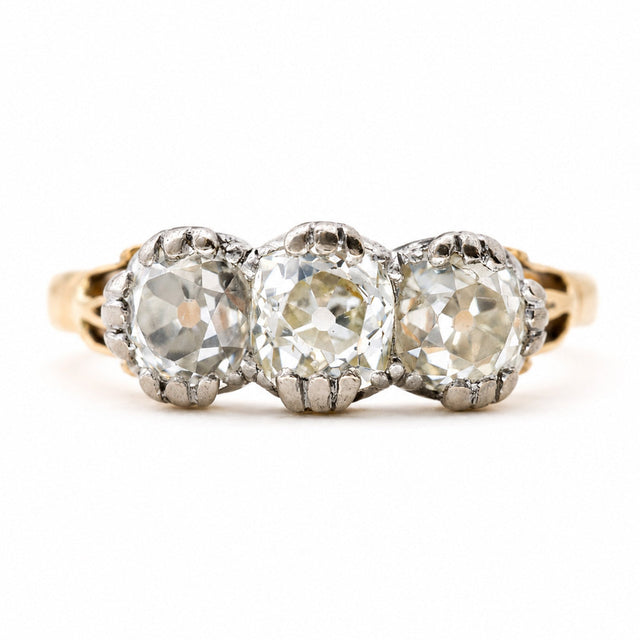 Antique Victorian three-stone diamond engagement ring with old-cut diamonds