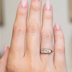 Victorian diamond engagement ring shown at full scale on the hand