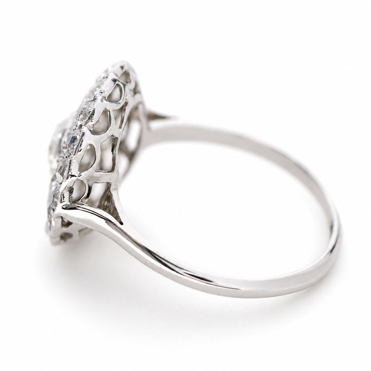 Antique Edwardian, subtly tinted old-cut diamond cluster ring