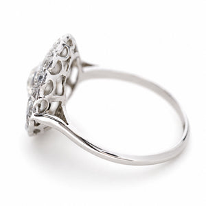 Antique Edwardian, subtly tinted old-cut diamond cluster ring