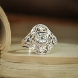 Antique diamond and sapphire cluster ring in Art Deco style