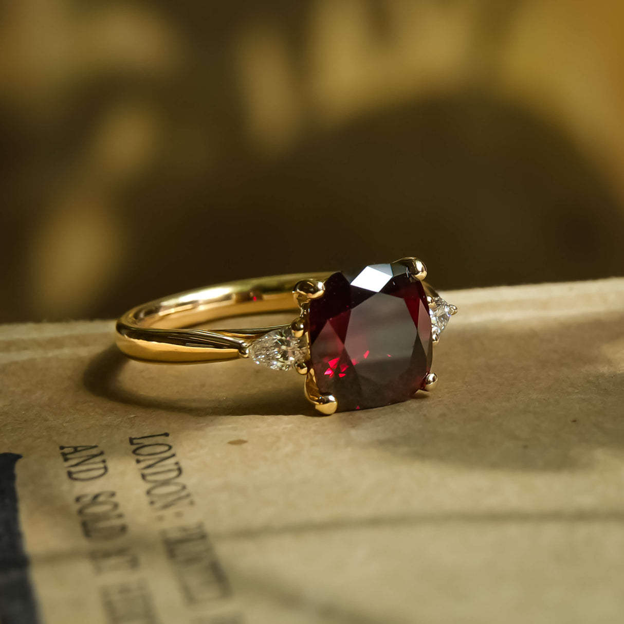 3ct ruby and diamond three stone engagement ring in yellow gold band