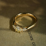 Champagne diamond and diamond three stone engagement ring in classic yellow gold setting