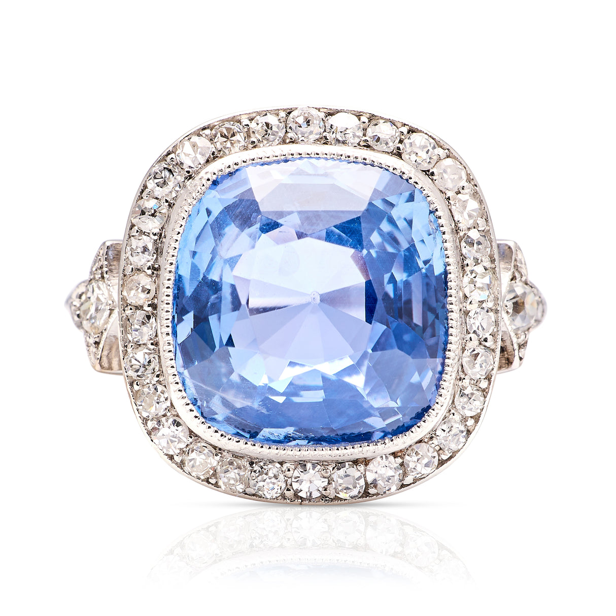 Antique, Belle Époque 8ct cushion-cut sapphire and diamond cluster ring, 18ct white gold