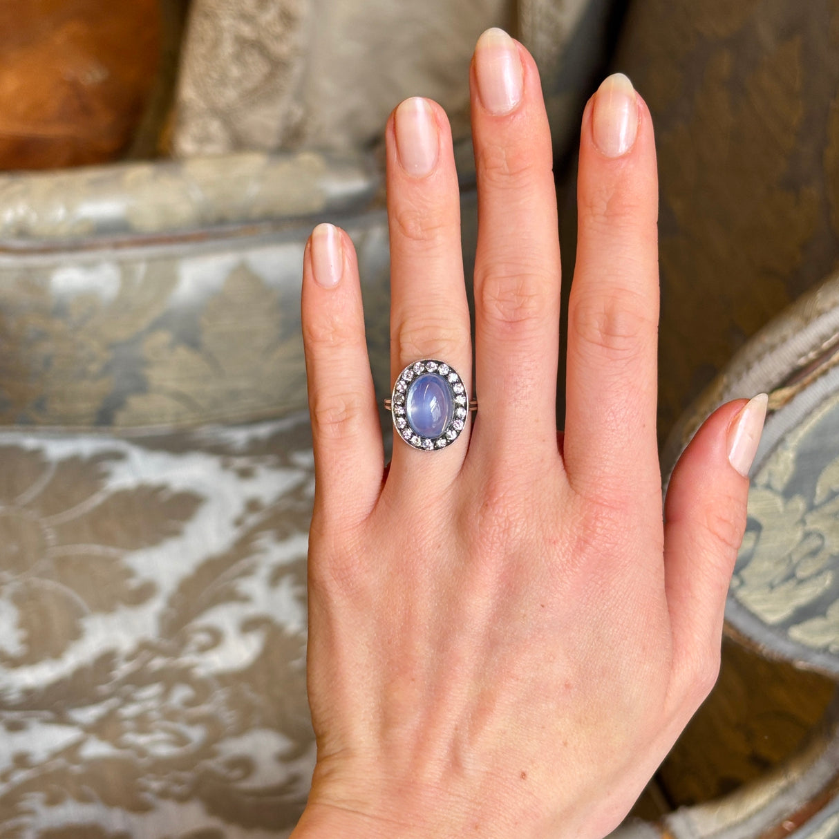 Antique, Edwardian cabochon sapphire & diamond cluster ring