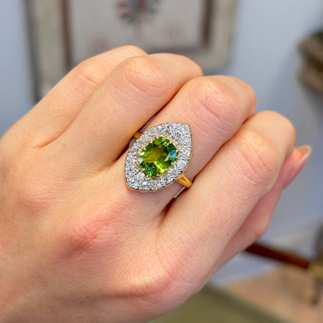 Vintage, impressive peridot & diamond navette ring