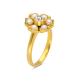 Antique old-cut diamond surrounded by pearls, 18ct yellow gold