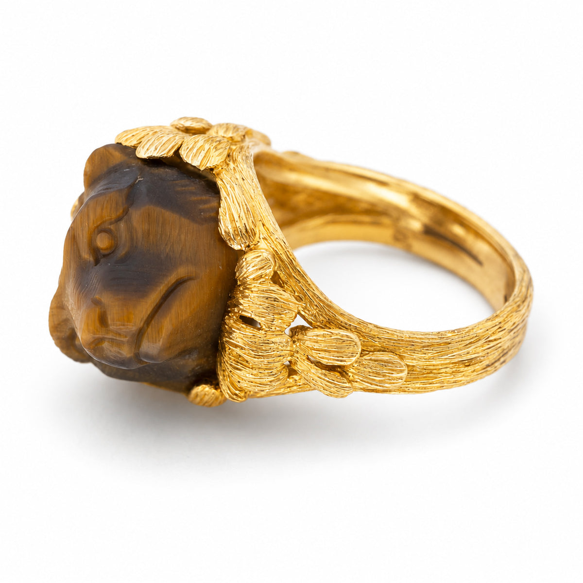 Vintage, 1980's French tiger's eye honey bear yellow gold cocktail ring on a white background