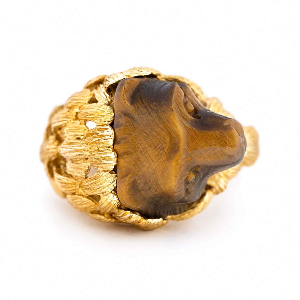 yellow gold Vintage, 1980's French tiger's eye honey bear ring seen from the top against a white background