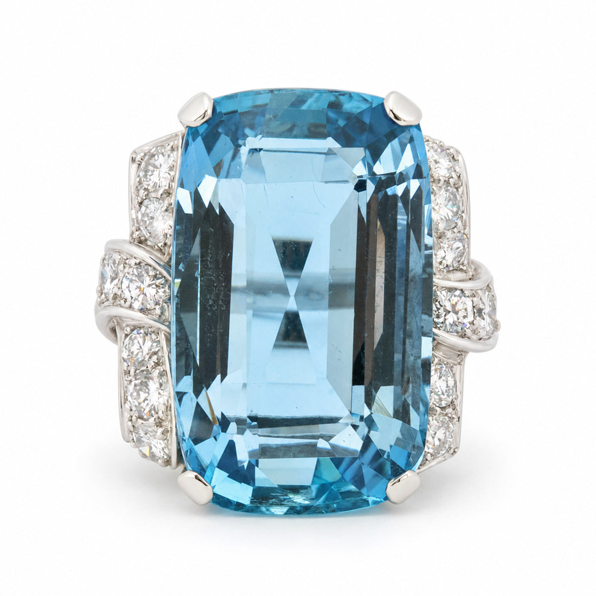 Antique Art Deco aquamarine and diamond cocktail ring in platinum, featuring a large rectangular step-cut aquamarine and diamond-set shoulders.