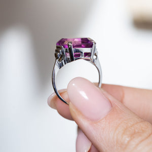 Side profile of the Art Deco cocktail ring, highlighting the open gallery, geometric shoulder details and polished white gold band.