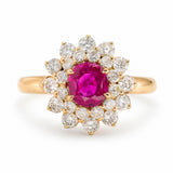 A yellow gold vintage, 1980s Burmese ruby & diamond halo cluster ring.